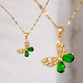 Mariposa colgante y aretes